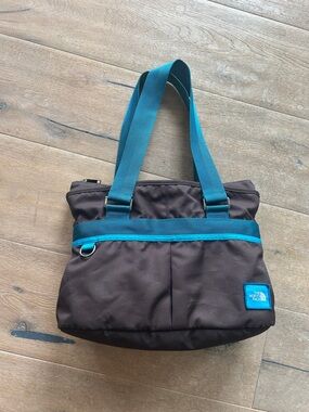 The North Face Brown Bag with Teal Logo Patch